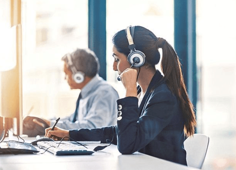 Fusion CX customer-support agents working in a contact centre, illustrating the human-led services business behind its IPO.